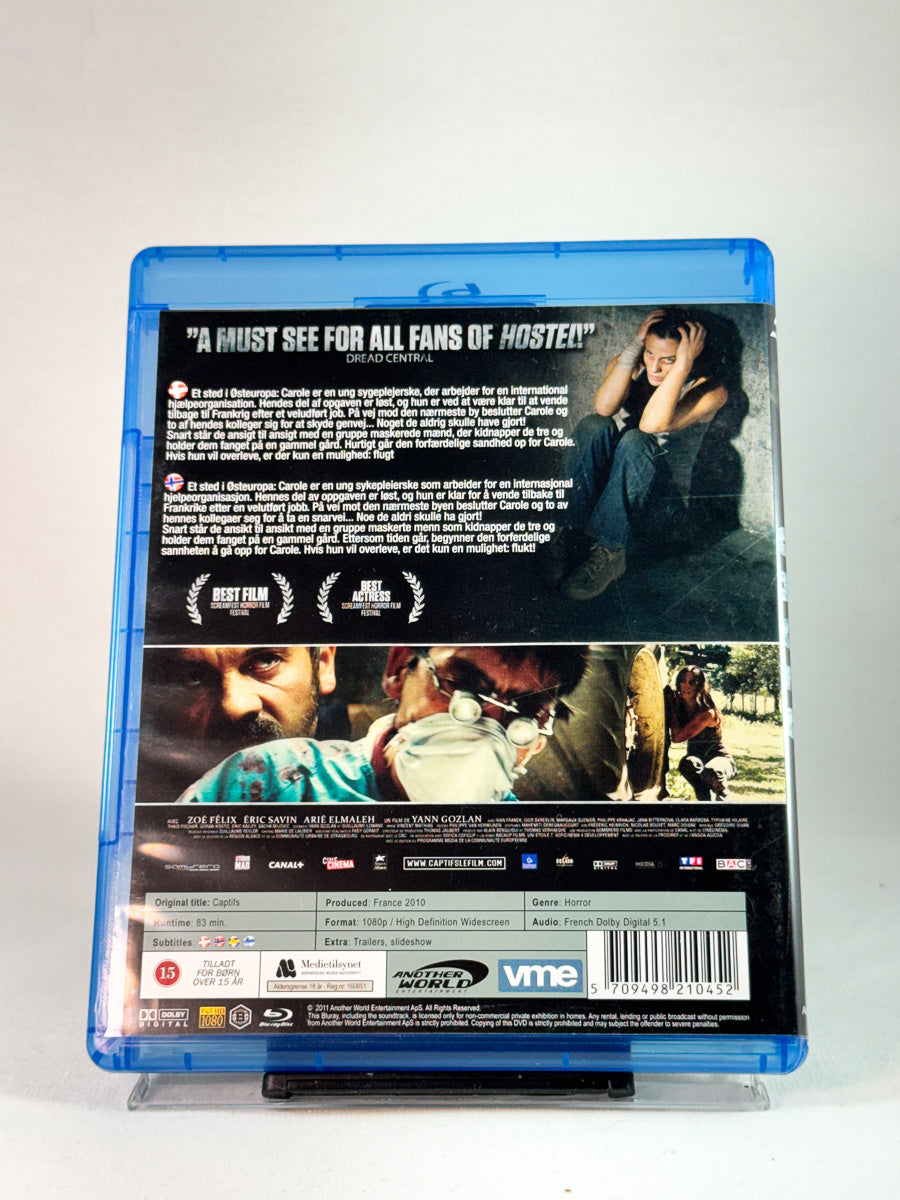 Bakside av cover til Caged, bruktfilm hos nettbutikken Brukbar Film
