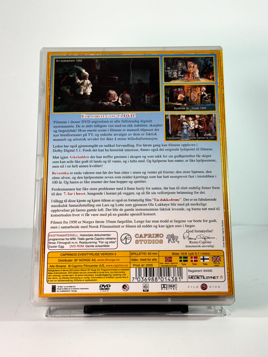 Bakside av cover til caprinos eventyrlige verden 3 – en dukkedrøm reveenka 7 far i huset askeladden og de gode hjelperne, brukt DVD hos Brukbar Film