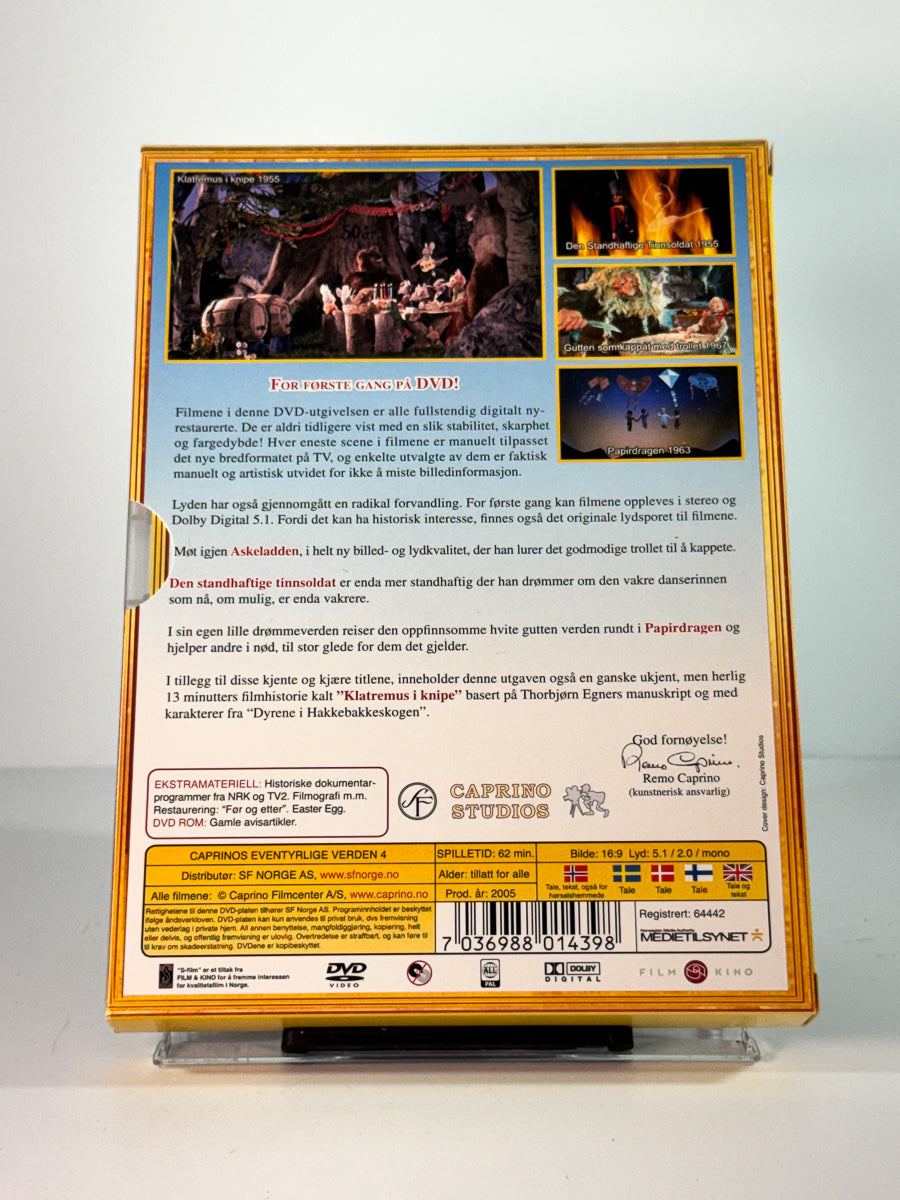 Bakside av slipcase cover til caprinos eventyrlige verden – gutten som kappåt med trollet papirdragen klatremus i knipe den standhaftige tinnsoldat, brukt original DVD hos Brukbar Film