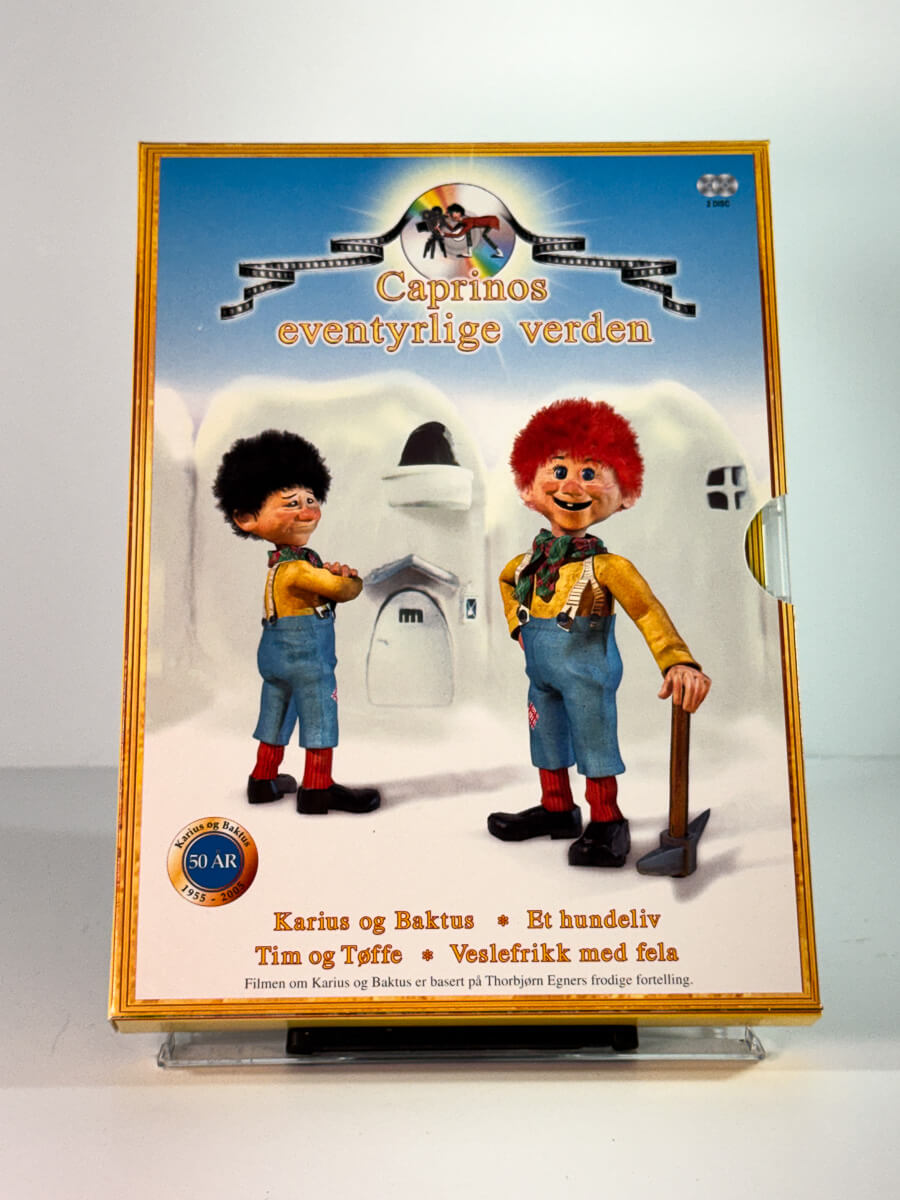 Forside av slipcase cover til caprinos eventyrlige verden – karius og baktus et hundeliv tim og toffe veslefrikk med fela, bruktfilm på DVD hos Brukbar Film