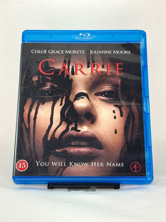 Forside av Blu-ray-cover til Carrie – brukt skrekkfilm på Blu-ray, tilgjengelig fra Brukbar Film.