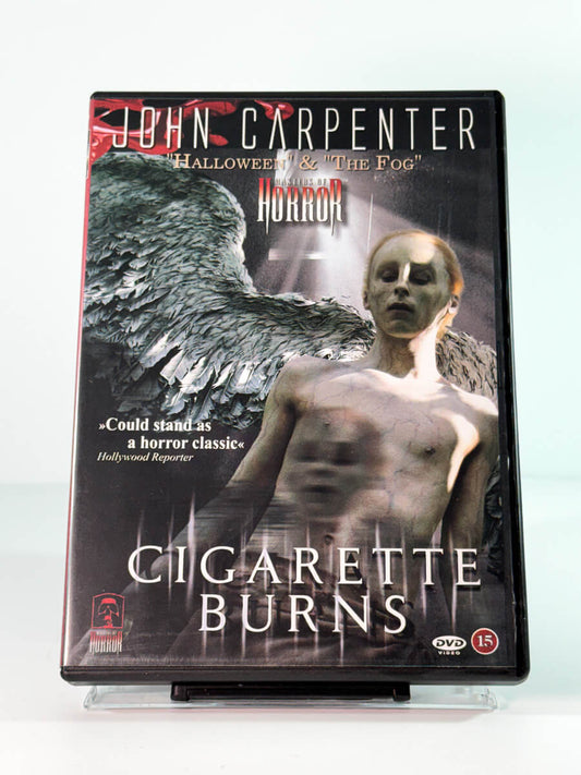 Forside av cover til cigarette burns, bruktfilm hos nettbutikken Brukbar Film