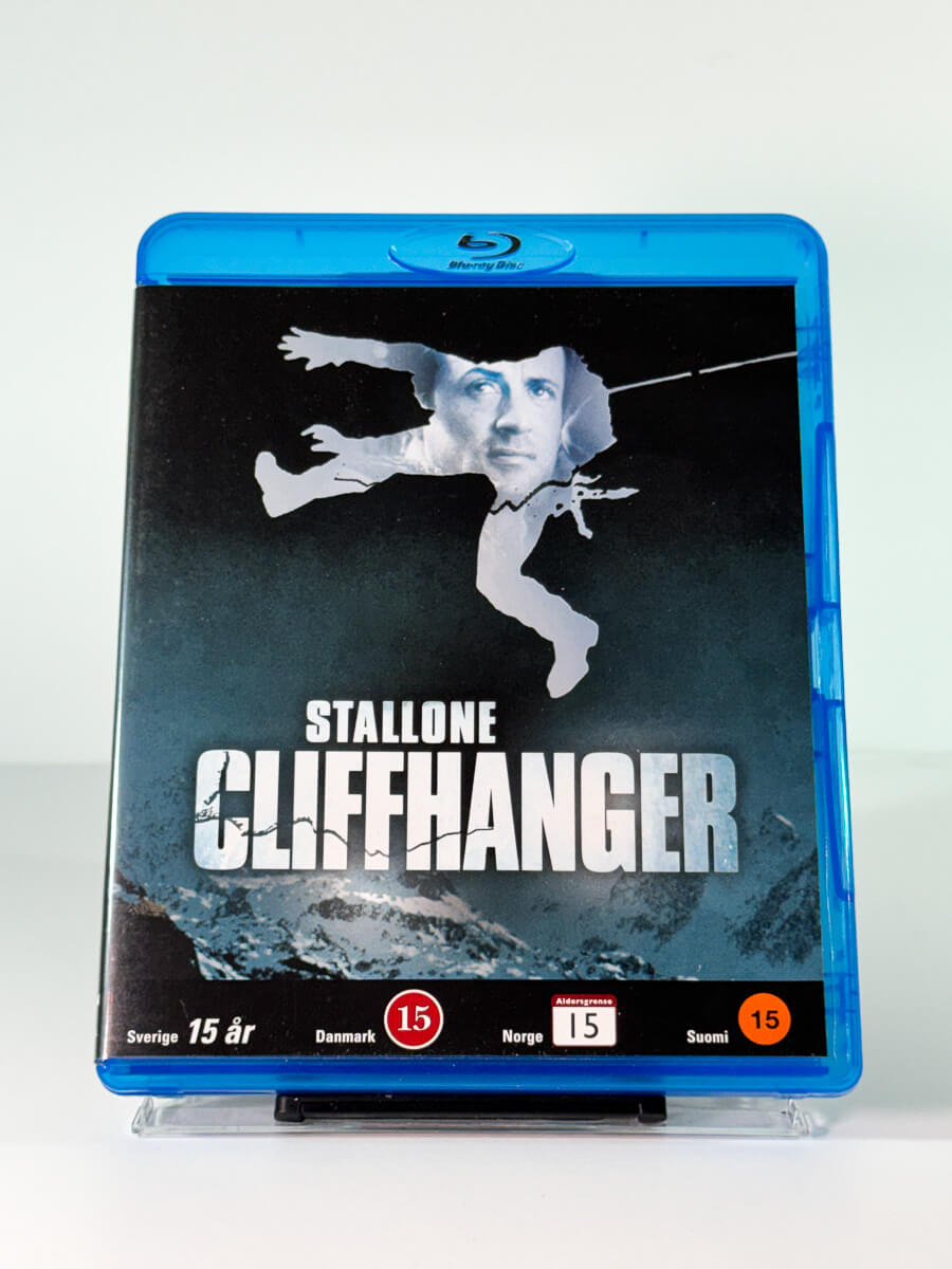 Forside av cover til Cliffhanger på Blu-ray, bruktfilm hos Brukbar Film