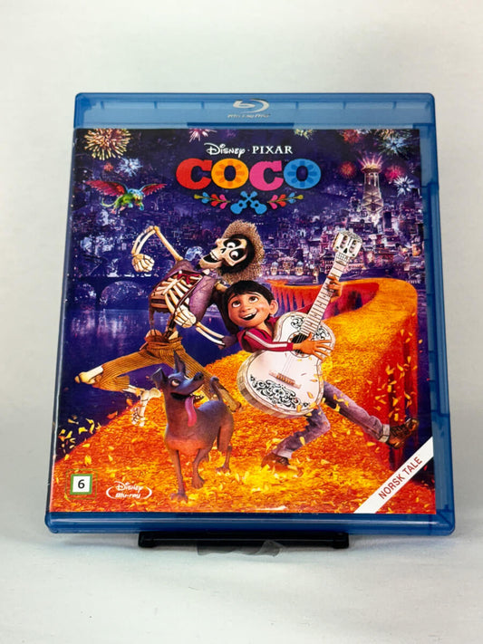 Forside av Blu-ray-cover til Coco – brukt Disney Pixar-film på Blu-ray, familieklassiker tilgjengelig hos Brukbar Film.