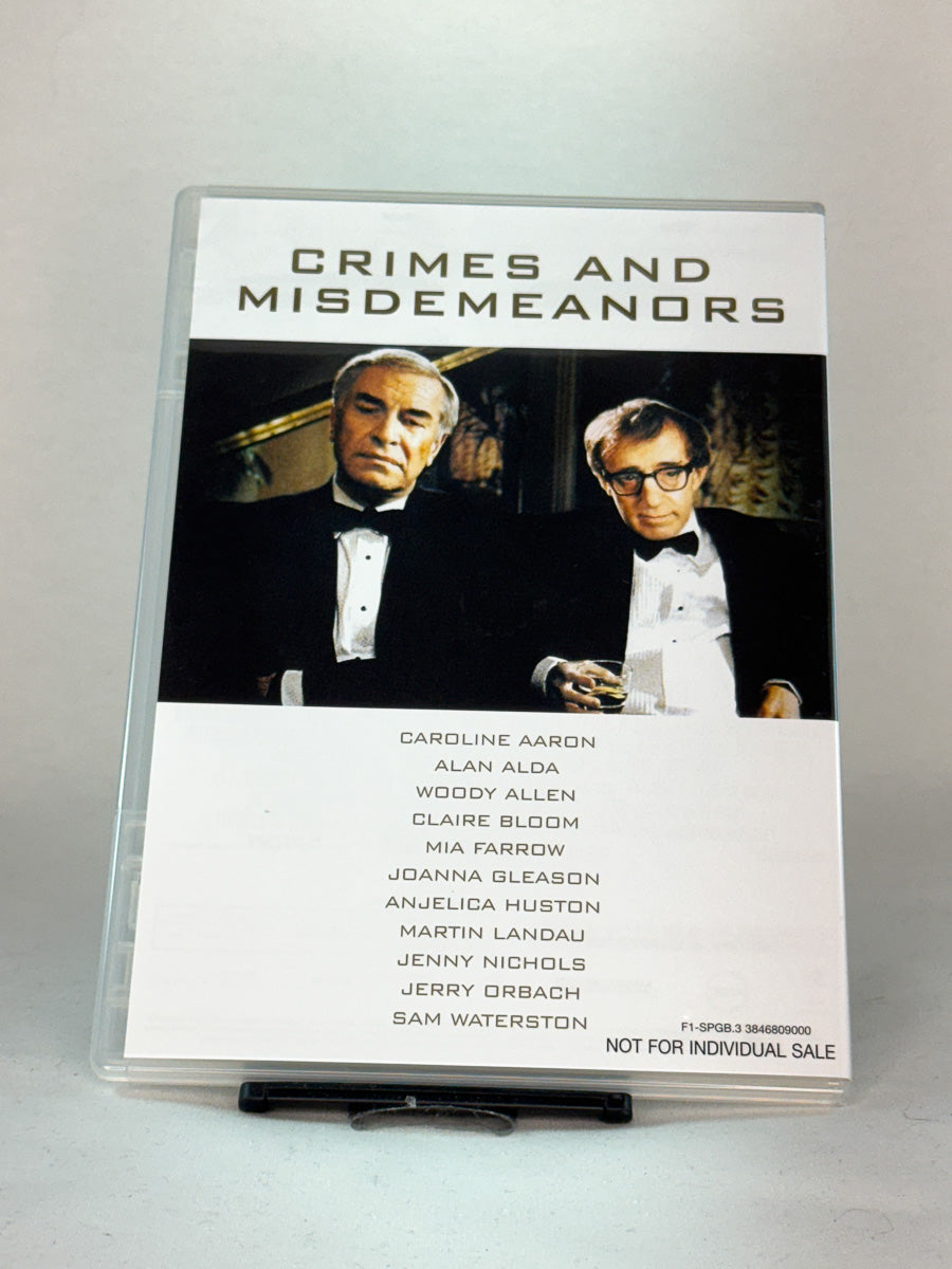 Forside av DVD-cover til Crimes and Misdemeanors – mørk og tankevekkende film av Woody Allen med Alan Alda og Martin Landau, brukt DVD hos Brukbar Film.