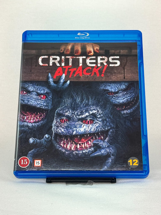 Forside av Blu-ray-cover til Critters Attack! – brukt filmcover tilgjengelig hos Brukbar Film, original utgave på Blu-ray.