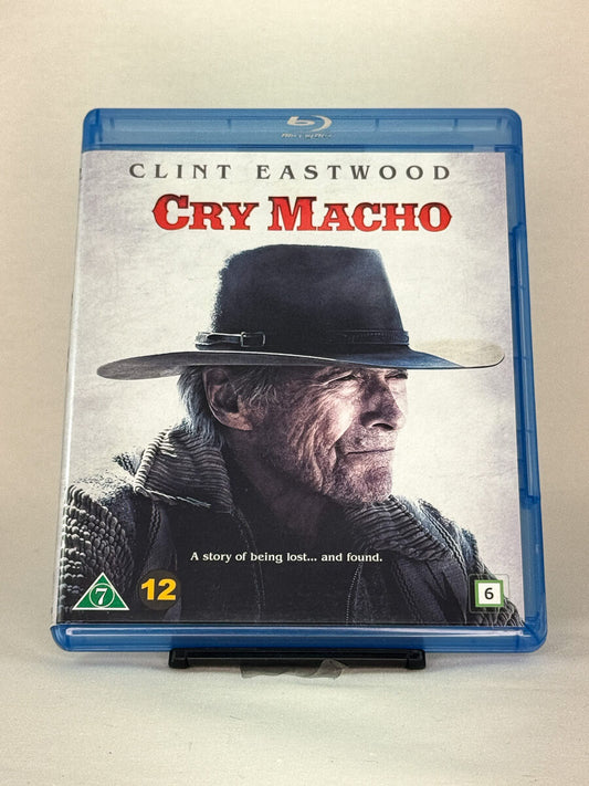 Forside av Blu-ray-cover til Cry Macho – brukt Clint Eastwood-film på Blu-ray, tilgjengelig hos Brukbar Film.