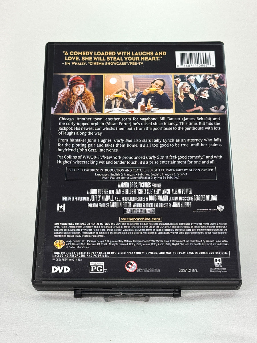 Bakside av cover til Curly Sue, bruktfilm på DVD hos Brukbar Film