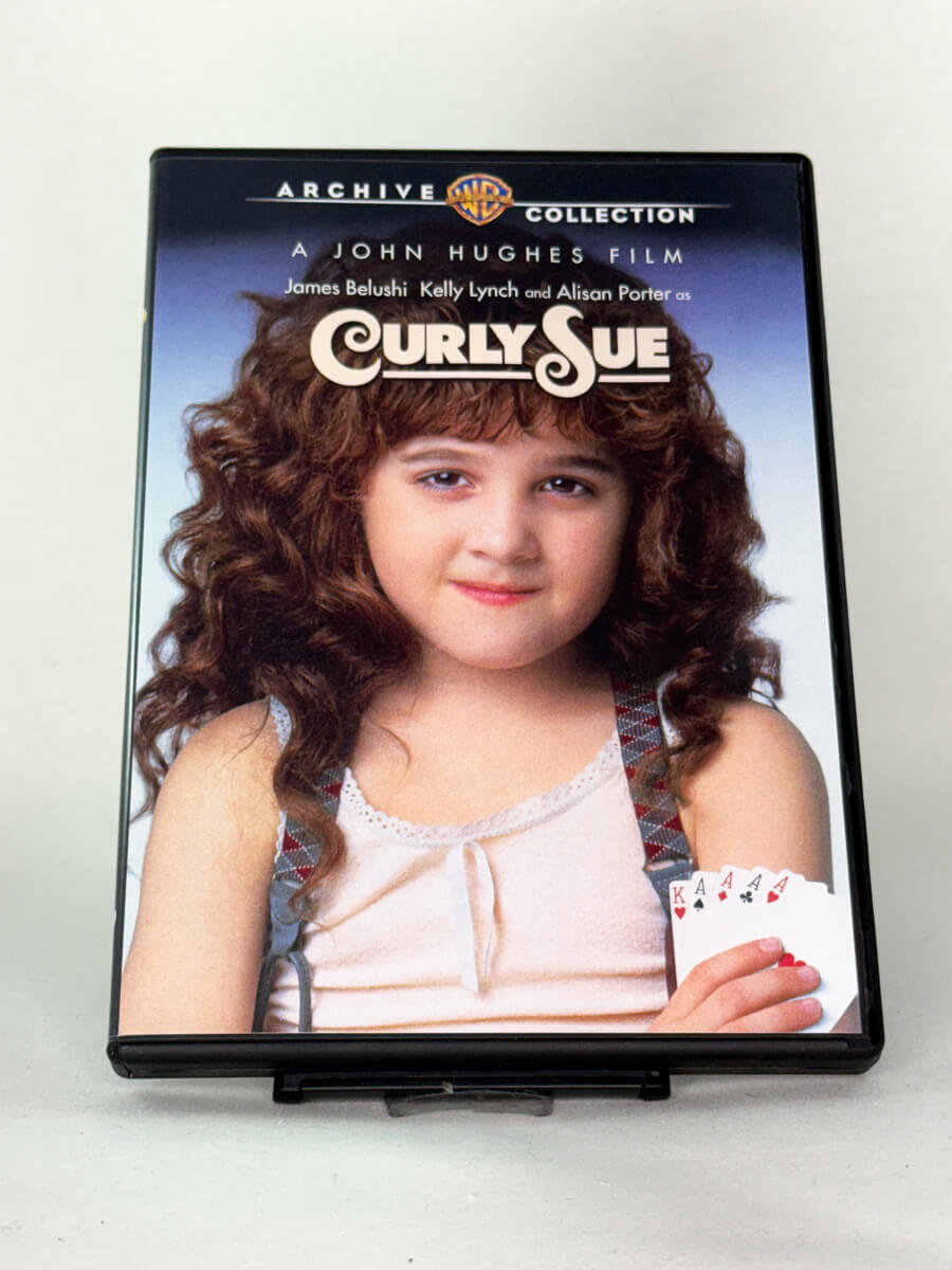 Forside av cover til Curly Sue, brukt DVD hos Brukbar Film