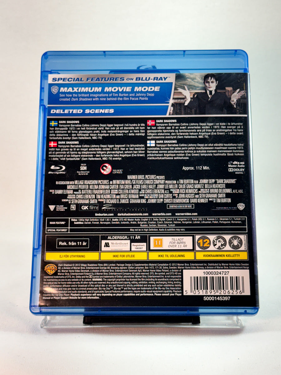 Bakside av cover til Dark Shadows, bruktfilm hos nettbutikken Brukbar Film