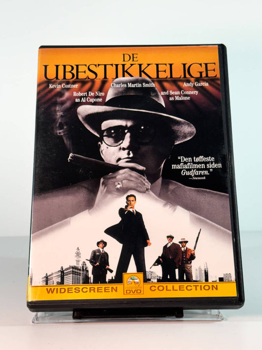 Forside av cover til De ubestikkelige, bruktfilm hos nettbutikken Brukbar Film