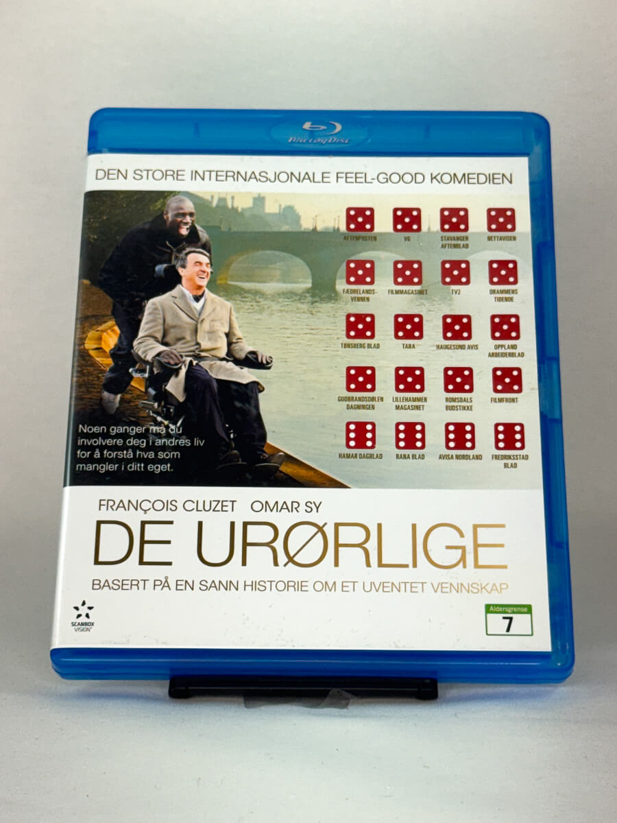 Forside av Blu-ray-cover til De urørlige (Intouchables) – brukt feelgood-film basert på sann historie, kjøp hos Brukbar Film