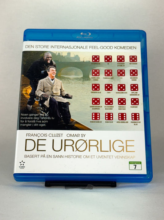 Forside av Blu-ray-cover til De urørlige (Intouchables) – brukt feelgood-film basert på sann historie, kjøp hos Brukbar Film