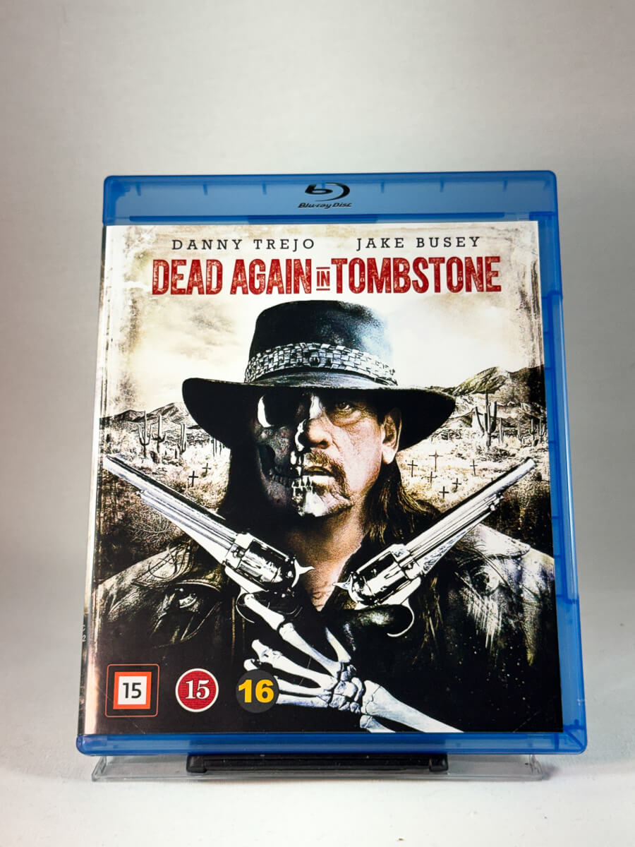 Forside av cover til Dead Again in Tombstone, brukt Blu-ray hos Brukbar Film