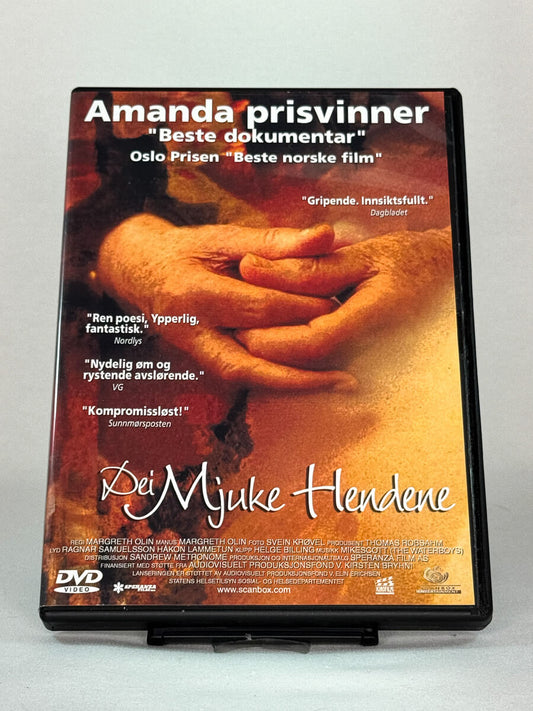 Forside av brukt DVD Dei mjuke hendene – prisvinnende norsk dokumentarfilm på original brukt DVD fra Brukbar Film