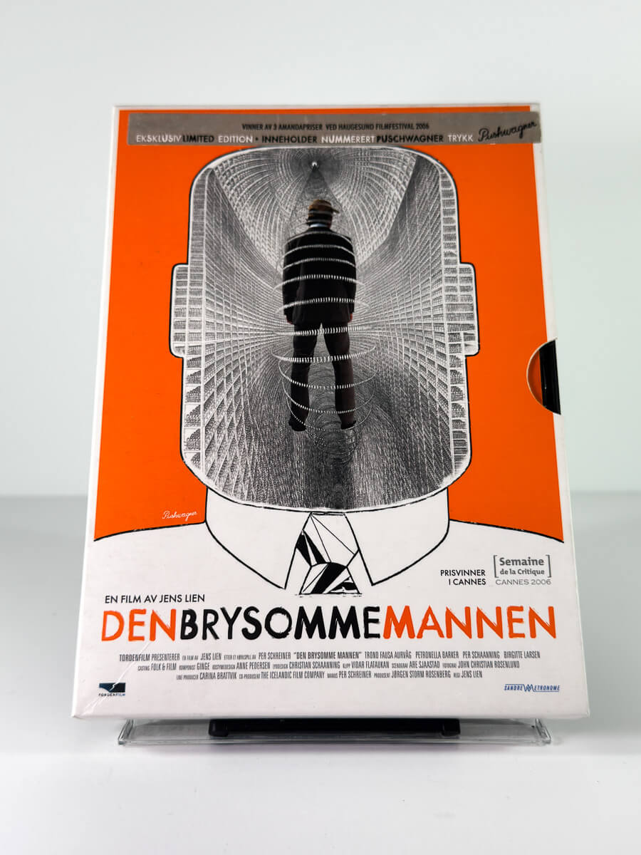Forside av cover til Den Brysomme Mannen på DVD i Limited Edition med Pushwagner trykket Selvportrett. 