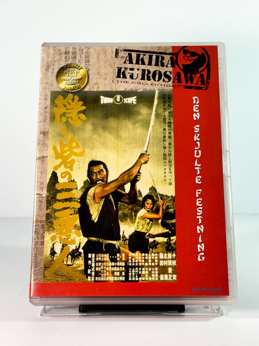 den-skjulte-festning-dvd-cover-forside
Forside av cover til den skjulte festning, bruktfilm på DVD hos Brukbar Film
