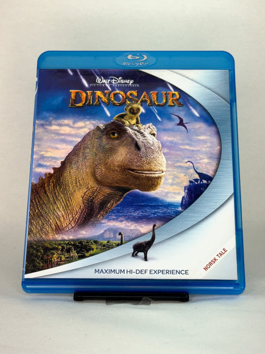Forside av Blu-ray-cover til filmen Dinosaur – spektakulær Disney-animasjon, brukt Blu-ray hos Brukbar Film