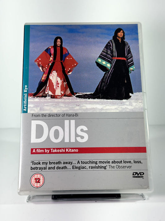 Forside av cover til Dolls, bruktfilm hos nettbutikken Brukbar Film
