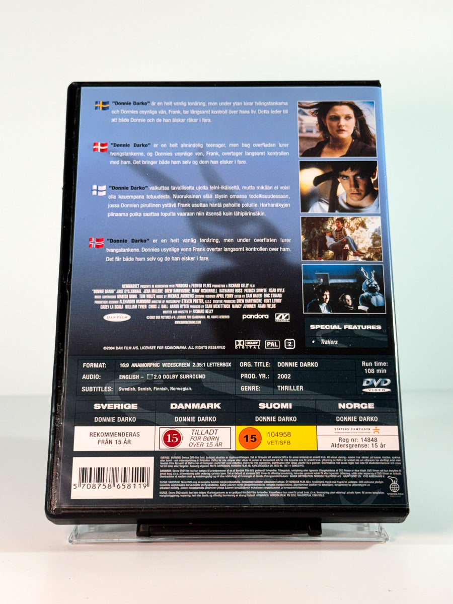 Bakside av cover til Donnie Darko, bruktfilm på DVD hos Brukbar Film