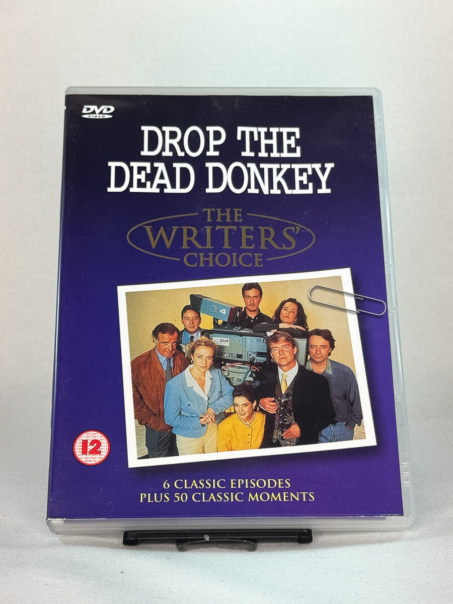Forside av DVD-cover til Drop the Dead Donkey, bruktfilm på DVD hos Brukbar Film