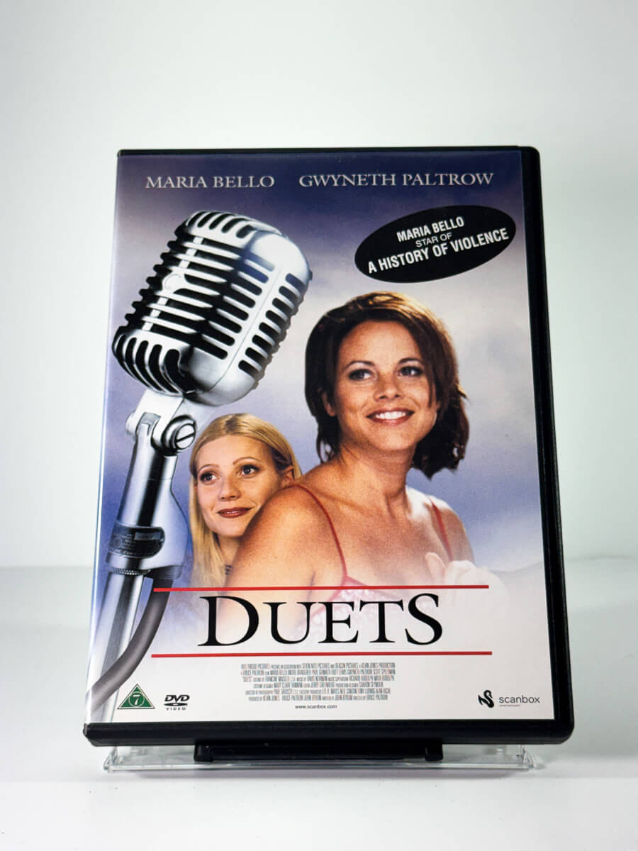 Forside av cover til duets, bruktfilm på DVD hos Brukbar Film
