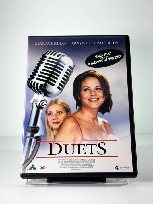 Forside av cover til duets, bruktfilm på DVD hos Brukbar Film