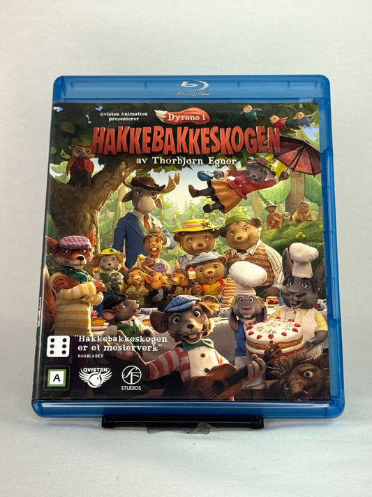 Forside av Blu-ray-cover til Dyrene i Hakkebakkeskogen – brukt barnefilm og familieklassiker tilgjengelig hos Brukbar Film