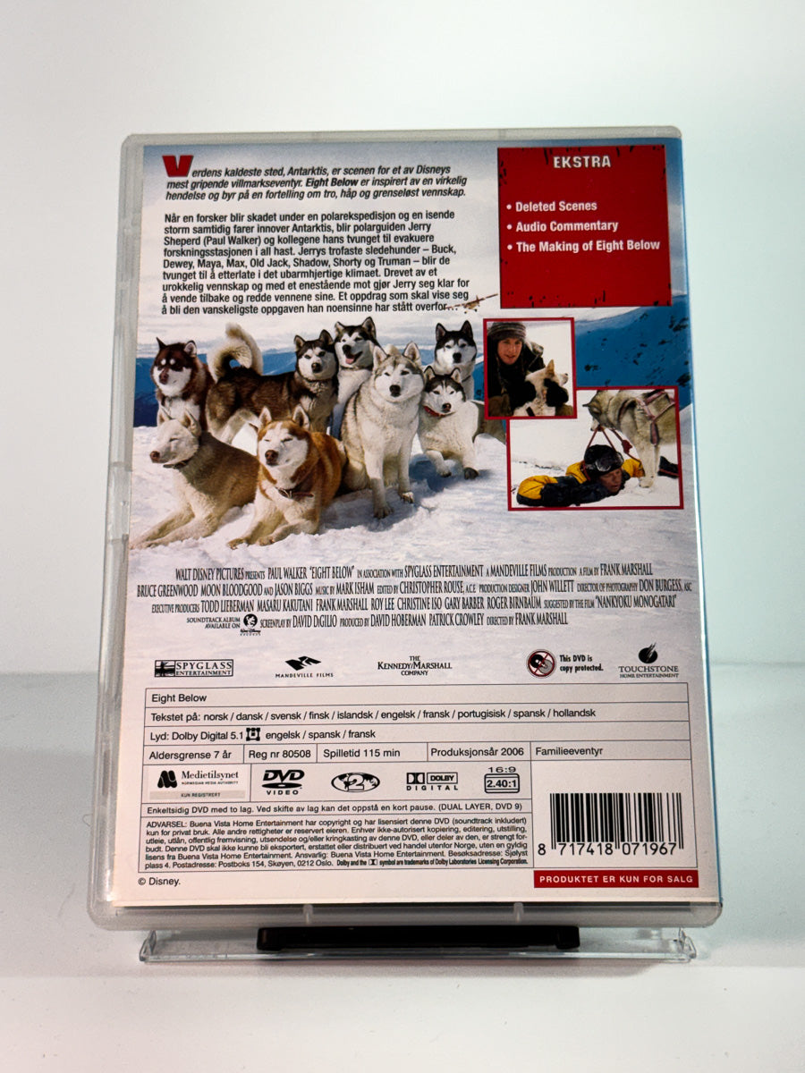 Bakside av cover til eight below, brukt DVD hos Brukbar Film