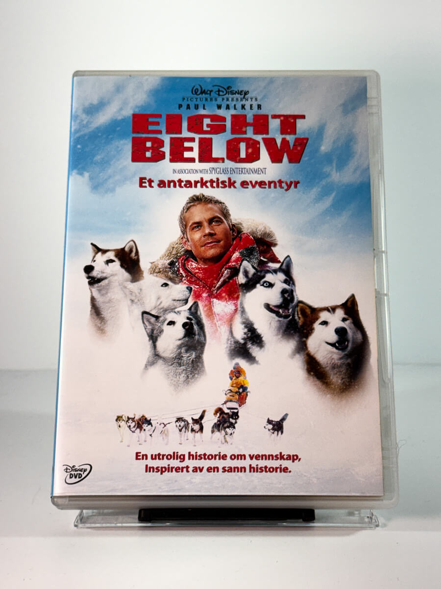 Forside av cover til eight below, brukt original DVD hos Brukbar Film