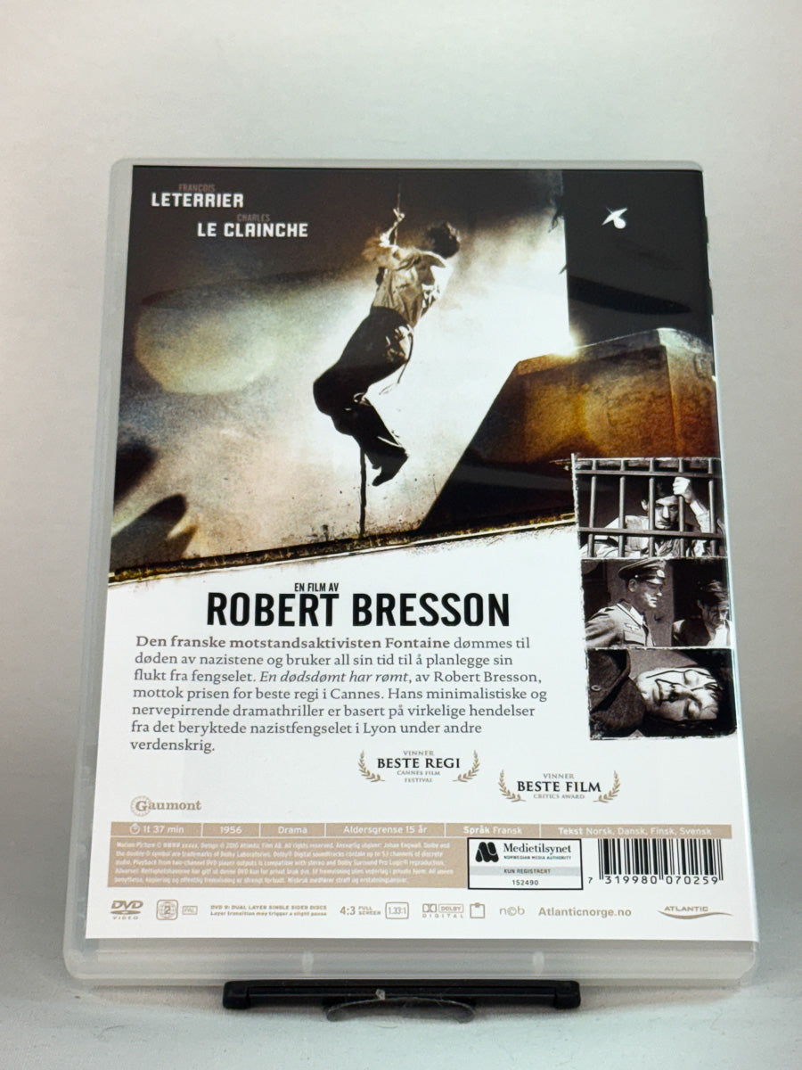Bakside av DVD-cover til En dødsdømt har rømt, bruktfilm på DVD hos Brukbar Film