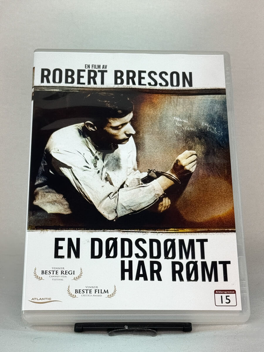 Forside av DVD-cover til En dødsdømt har rømt, brukt original DVD hos Brukbar Film