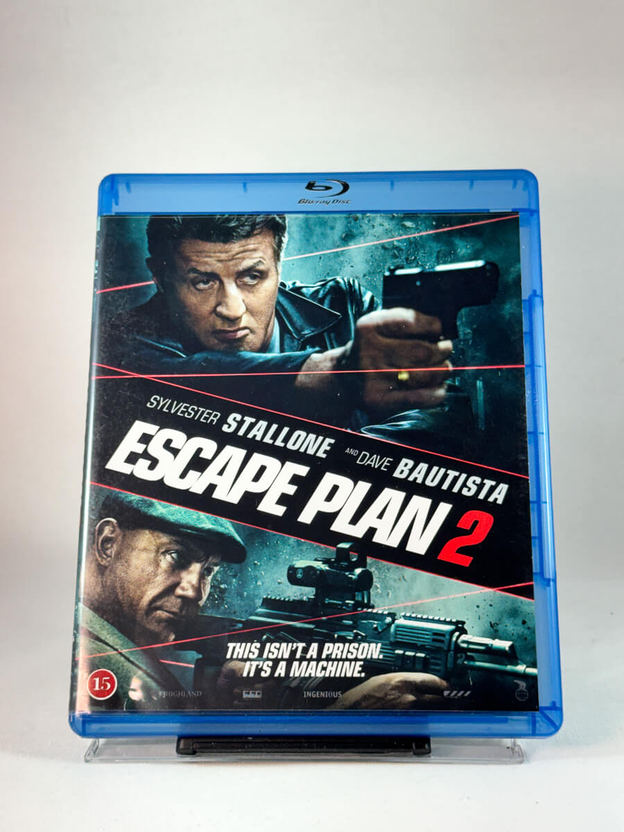 Forside av cover til Escape Plan 2, brukt original Blu-ray hos Brukbar Film