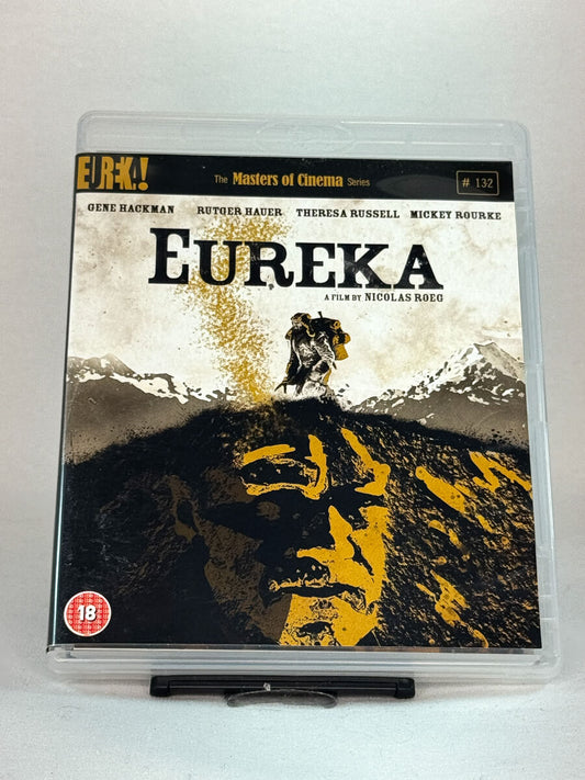 Forside av Blu-ray-cover til Eureka – Nicolas Roegs intense drama med Gene Hackman, Rutger Hauer og Mickey Rourke, fra Masters of Cinema-serien, brukt Blu-ray hos Brukbar Film.