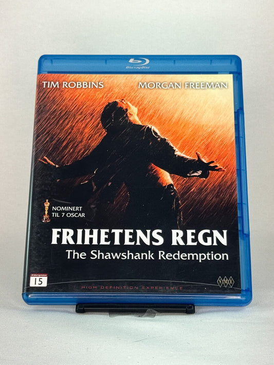 Forside av Frihetens regn Blu-ray-cover – brukt klassiker med Tim Robbins og Morgan Freeman, hos Brukbar Film