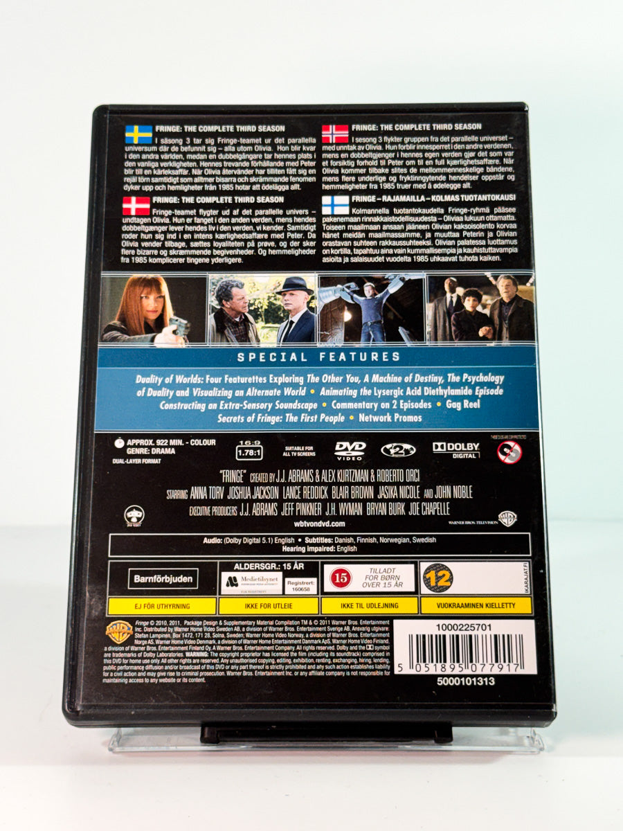 Bakside av cover til Fringe – The Complete Third Season, brukt DVD hos Brukbar Film