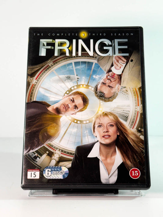 Forside av cover til Fringe – The Complete Third Season, bruktfilm hos nettbutikken Brukbar Film