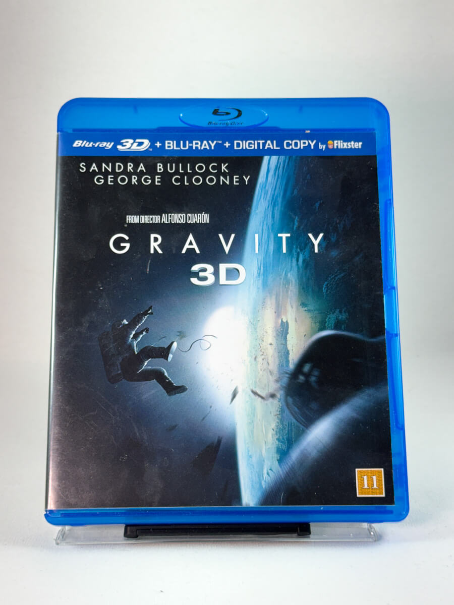 Forside av DVD-cover til Gravity (Blu-ray 3D), bruktfilm hos nettbutikken Brukbar Film