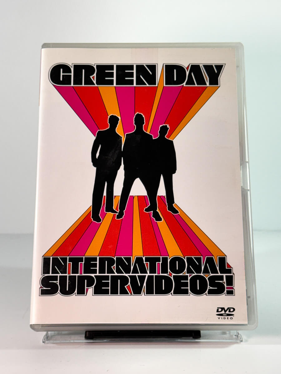 Forside av cover til Green Day: International Supervideos!, bruktfilm hos nettbutikken Brukbar Film