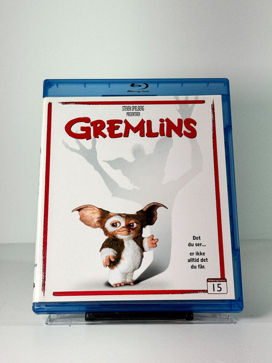 Forside av cover til Gremlins, bruktfilm hos nettbutikken Brukbar Film