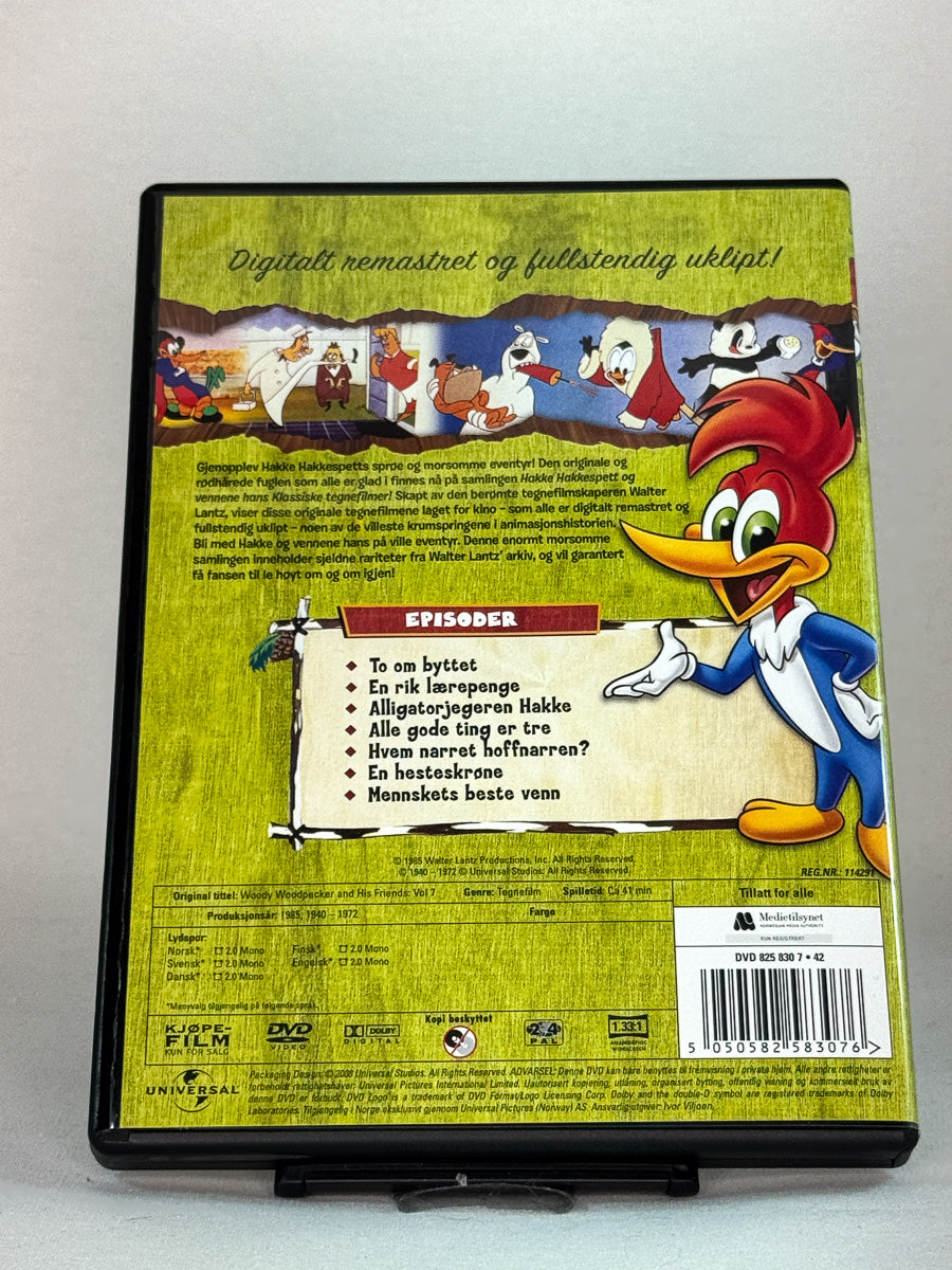 Bakside av DVD-cover til Hakke Hakkespett Vol. 7 – samling med latterfylte tegnefilmer for barn, brukt originalutgave hos Brukbar Film.