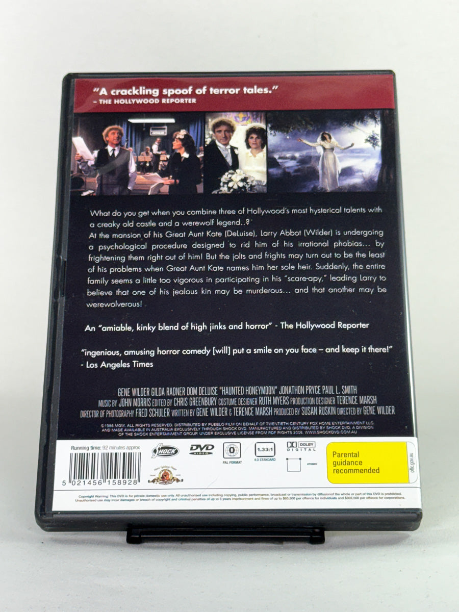 Bakside av DVD-cover for filmen Haunted Honeymoon – brukt originalfilm på DVD, en blanding av komedie og horror, tilgjengelig hos Brukbar Film
