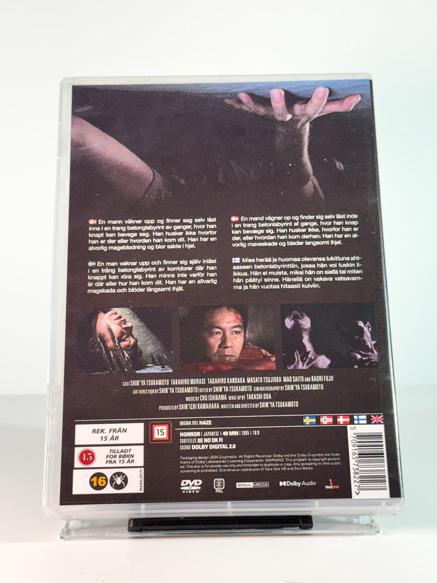 Bakside av cover til Haze, brukt original DVD hos Brukbar Film