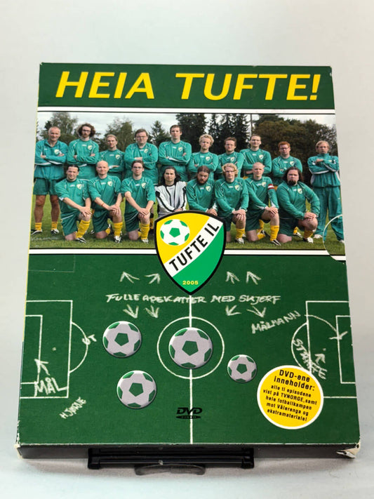 Forside av DVD-cover til Heia Tufte! – den legendariske reality-serien der helt vanlige menn danner fotballaget Tufte IL under ledelse av Jarle Tøfte, brukt DVD hos Brukbar Film.