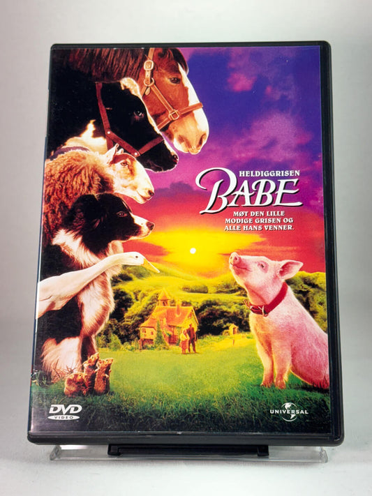 Forside av DVD-cover til Heldiggrisen Babe, second hand DVD hos Brukbar Film