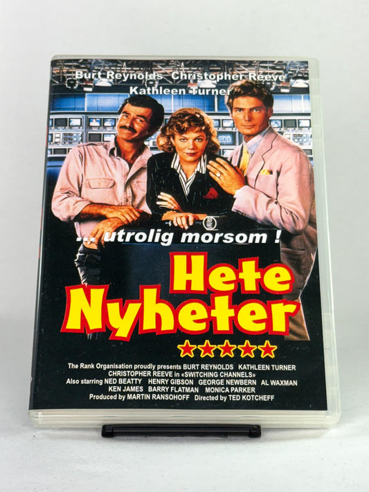 DVD-cover-forside til filmen Switching Channels (Hete nyheter) – Brukt DVD fra nettbutikken Brukbar Film