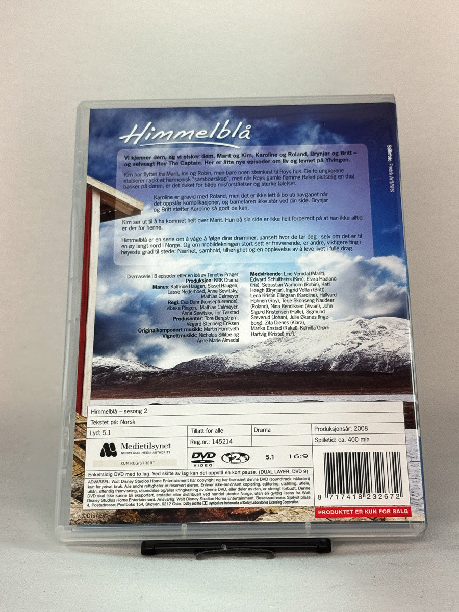 Bakside av DVD-cover til «Himmelblå – Sesong 2» – omtale, spesifikasjoner og spilletid, brukt DVD-utgave hos Brukbar Film.