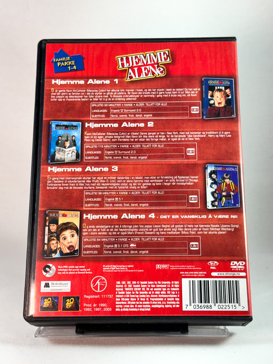 Bakside av cover til Hjemme Alene – Familiepakke 1–4, bruktfilm hos nettbutikken Brukbar Film