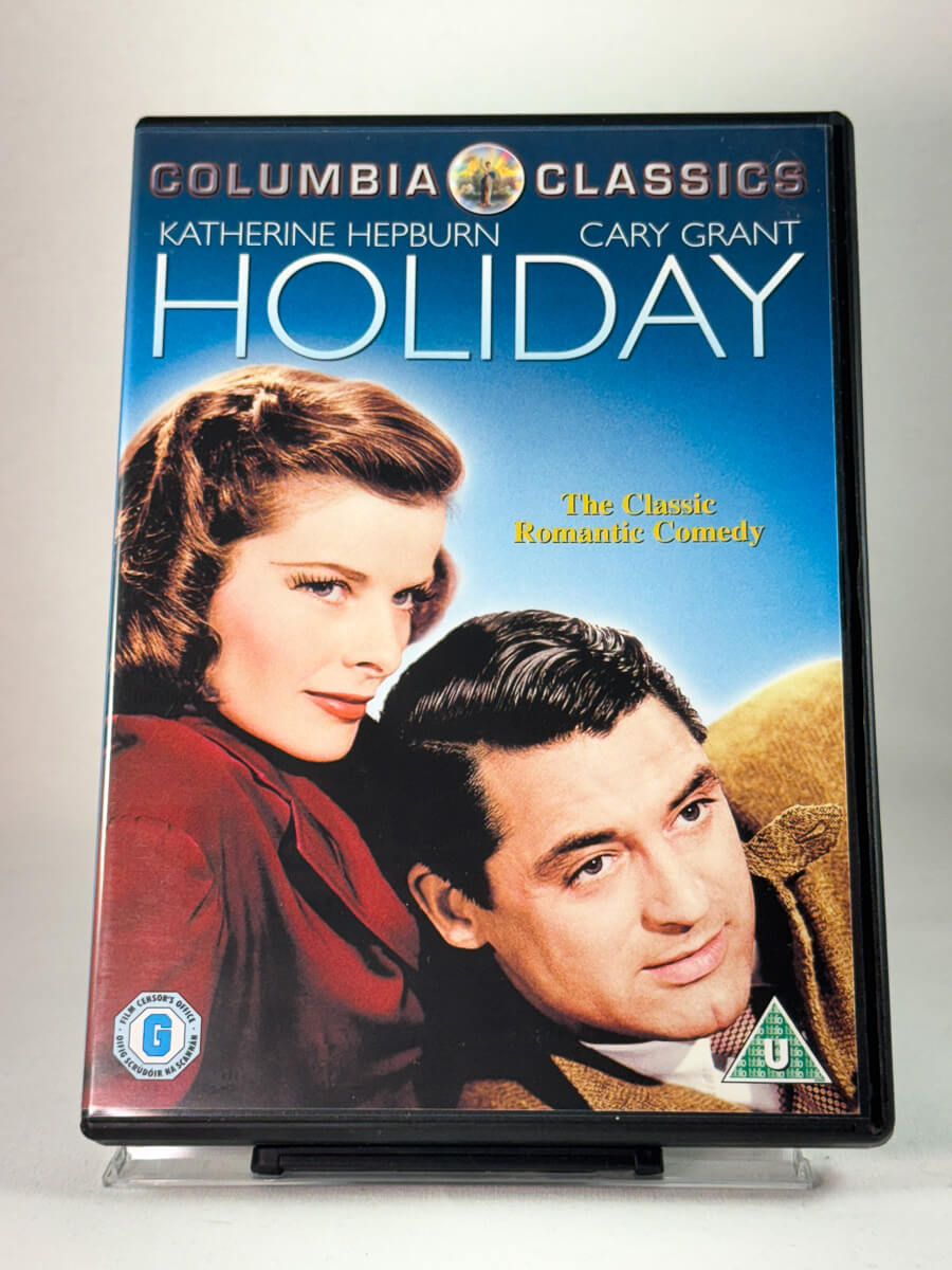Forside av DVD-cover til Holiday, bruktfilm hos nettbutikken Brukbar Film