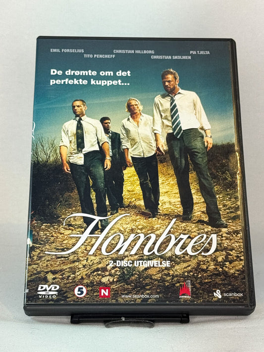 Forside av DVD-cover til Hombres – norsk krimserie med Pia Tjelta og Christian Skolmen om fire menn som drømmer om det perfekte kuppet, brukt TV-serie på DVD hos Brukbar Film.